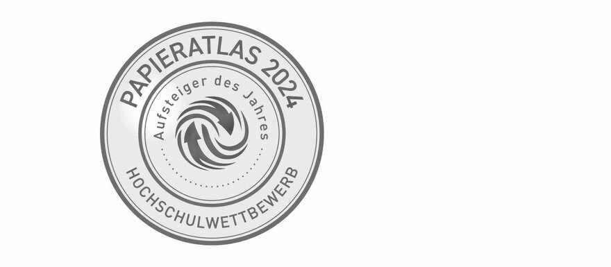 Medaille zur Auszeichnung in Form eines grauen Kreises auf weißem Grund mit dem Schriftzug Papieratlas 2024 - Aufsteiger des Jahres